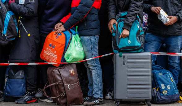 Immigrants standing in line